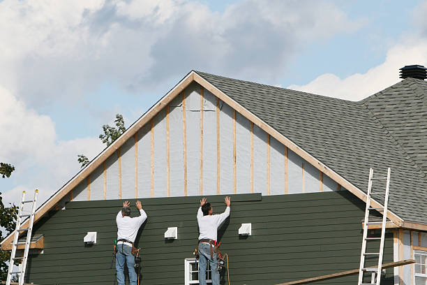 Professional Siding Contractor technician working in Riverside, NY